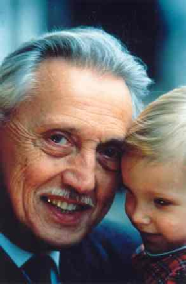 Photo of Professor Lejeune holding a child